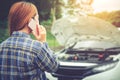 Young Woman calling for assistance with his car broken down by t Royalty Free Stock Photo