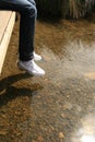 Young woman on the calm river Royalty Free Stock Photo