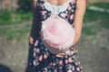 Young woman with candyfloss outside Royalty Free Stock Photo