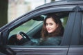 Young woman in a car