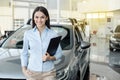 Young Woman in a Car Rental Service Assistant Concept Royalty Free Stock Photo