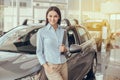 Young Woman in a Car Rental Service Assistant Concept Royalty Free Stock Photo
