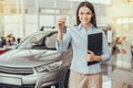 Young Woman in a Car Rental Service Assistant Concept Royalty Free Stock Photo