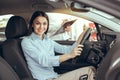 Young Woman in a Car Rental Service Test Drive Concept Royalty Free Stock Photo