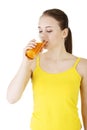 Young woman with the carrots juice Royalty Free Stock Photo