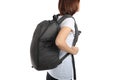 Young woman carrying with travel backpack isolated white background. Royalty Free Stock Photo