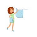 Young woman in casual clothing hanging wet clothes out to dry, housewife in housework activity cartoon vector Royalty Free Stock Photo