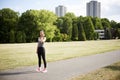 Woman catching a short break during jogging