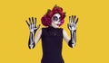 Young woman in Catrina costume gets scared at Day of the Dead or Halloween party Royalty Free Stock Photo