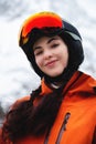 young woman of Caucasian ethnicity looks to the side and smiles, raising her head to the sky, enjoying her vacation at Royalty Free Stock Photo