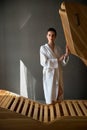 Young woman with cedar barrel. Spa and medical  procedures and treatment Royalty Free Stock Photo