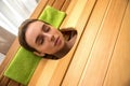 Young woman in cedar barrel. Spa and medical  procedures and treatment Royalty Free Stock Photo