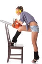 Young woman with a chainsaw