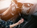 Young woman changing gears in car. Driving a car. Royalty Free Stock Photo