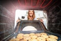 Woman open door to oven with freshly baked cookies Royalty Free Stock Photo