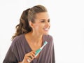 Young woman checking teeth after brushing