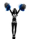 Young woman cheerleader cheerleading silhouette Royalty Free Stock Photo