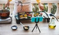 Young woman chef cooking outdoor while streaming online for webinar masterclass lesson at home during isolation quarantine - Food