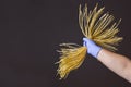 Young woman chef holds homemade pasta in the air over black background. Creative idea. Italian cuisine concept Royalty Free Stock Photo