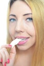 Young woman chewing gum