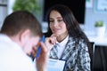 Young woman, chief regrets guilty employee man Royalty Free Stock Photo