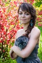 Young woman with chinchilla