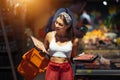 Young woman chooses meat in a grocery store Royalty Free Stock Photo