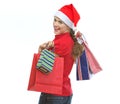 Young woman in Christmas hat with shopping bags Royalty Free Stock Photo