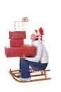 Young woman with christmas presents on sledge Royalty Free Stock Photo