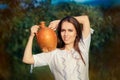 Young Woman with Clay Pitcher Royalty Free Stock Photo