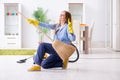 The young woman cleaning floor at home doing chores Royalty Free Stock Photo