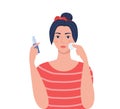 Young woman cleaning her face with cotton pad, holding cleaning lotion in her hand. Beauty, skin care and cosmetic concept. Vector Royalty Free Stock Photo