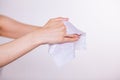 Two hands cleaning with wet wipes Royalty Free Stock Photo