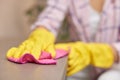 young woman cleaning table with microfiber cloth. Royalty Free Stock Photo