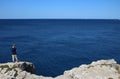 Lady looking out over Adriatic sea, Pula Croatia