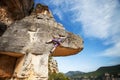 Young woman climber on a cliff Royalty Free Stock Photo