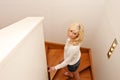 Young woman climbing stairs Royalty Free Stock Photo