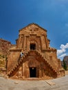 Young Woman climbing steep stairs of Noravank Monastery