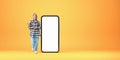 Young woman with clipboard in hands, big mockup phone display