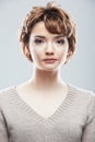 Young woman close up face beauty portrait.Short Hair style. Fem