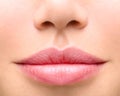 Young woman close up. plump lips