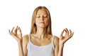 Young woman with closed eyes and hands in lotus gesture. Meditation, balance and peace of mind concept. Isolated over white Royalty Free Stock Photo