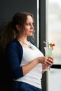 Young woman with a cocktail. Royalty Free Stock Photo