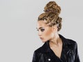 Young woman in Coho jacket.braids hairdo Royalty Free Stock Photo