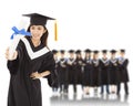 Young woman college graduate with students Royalty Free Stock Photo