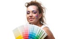 Young woman with a color guide. Royalty Free Stock Photo