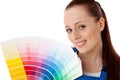 Young woman with a color guide. Royalty Free Stock Photo