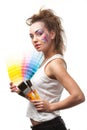 Young woman with a color guide and paintbrushes. Royalty Free Stock Photo