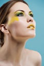Young woman with colored glamour make-up Royalty Free Stock Photo