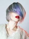 Young Woman with colorful hair, White Fur Royalty Free Stock Photo